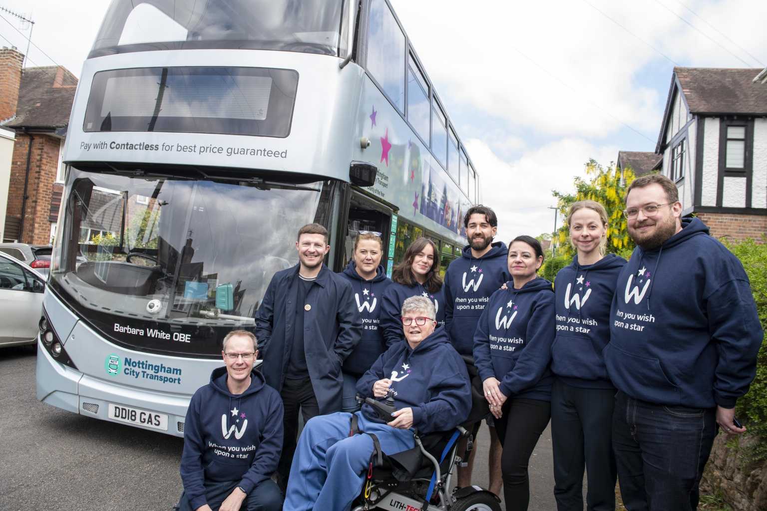Barbara White OBE with representatives from the charity.