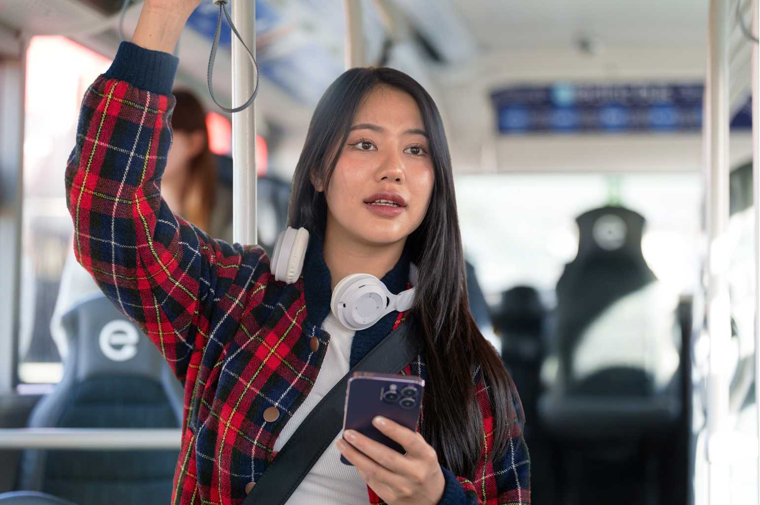 Student travelling on an NCT bus.